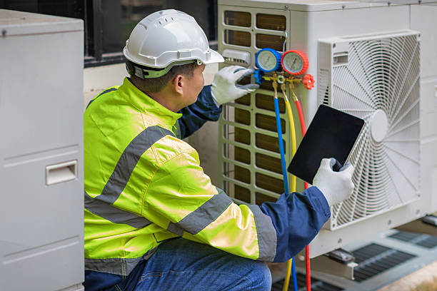 Professional Heat Pump Repair technician working in Mount Airy, NC
